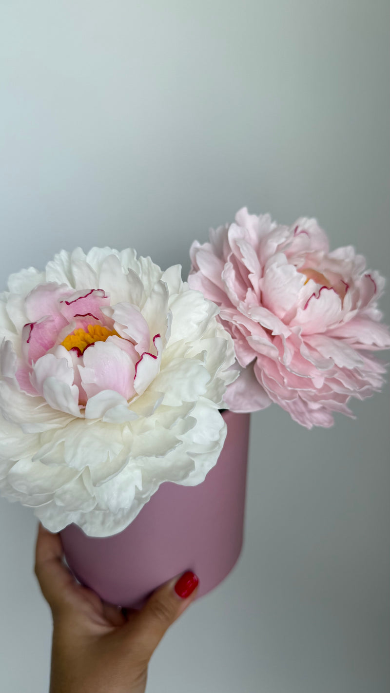 Realistic peony candle on a stem