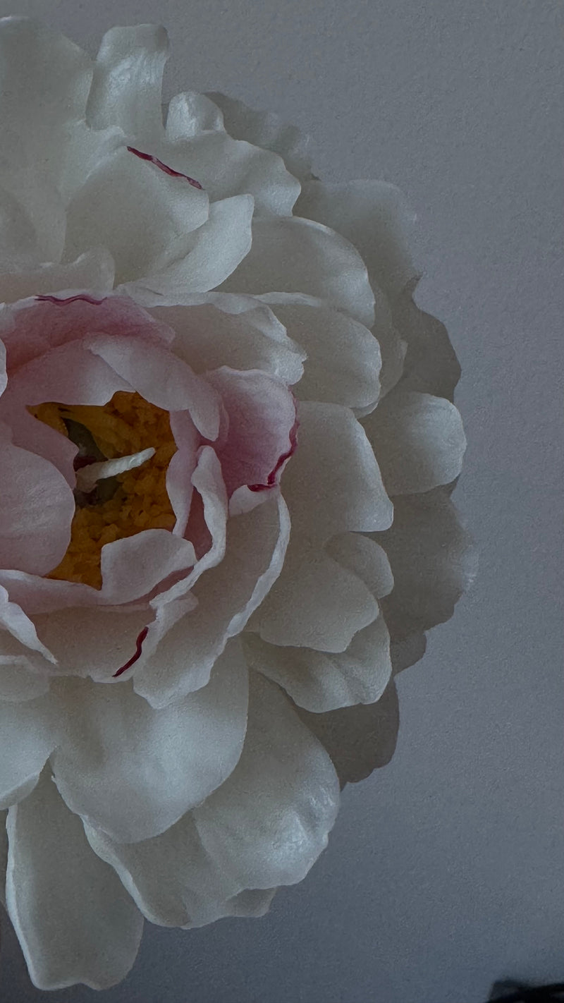 Realistic peony candle on a stem